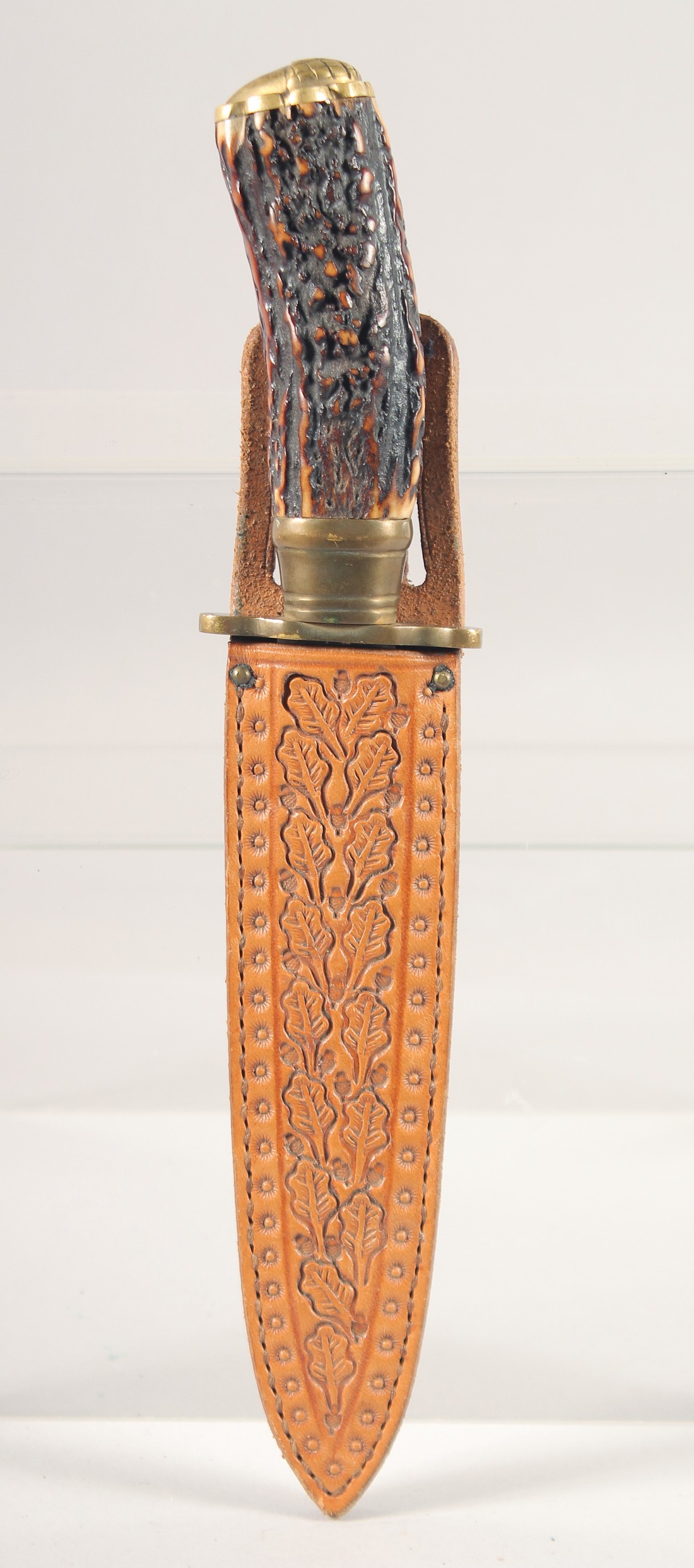 A KNIFE, with brass mounts and antler handle, in a sheath with oak leaves, 10" long. - Image 5 of 5