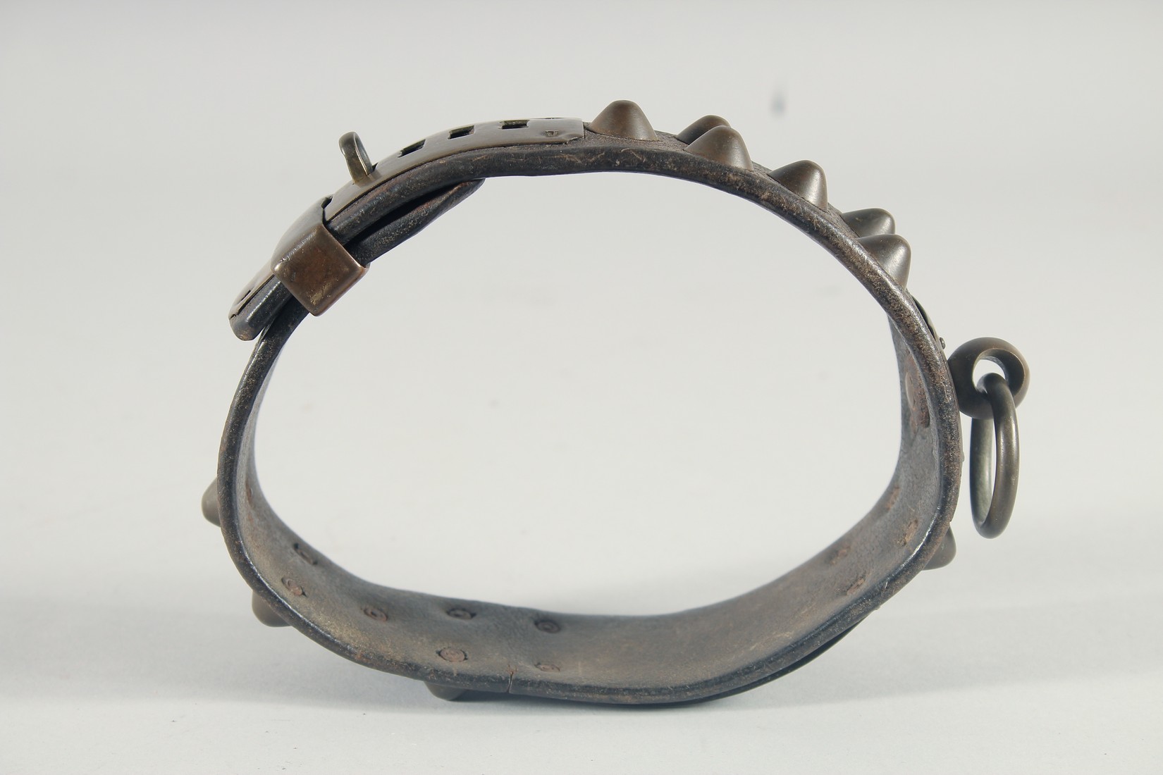 A 17th CENTURY LEATHER STUDDED BRASS DOG COLLAR, with six brass settings, stamped, possibly - Image 4 of 4
