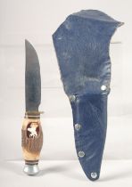 A SOLINGEN KNIFE, the antler handle carved with a deer's head.