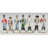 A SET OF SIX PORCELAIN SOLDIERS 6.5", another unrelated, (7).