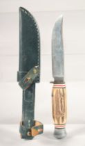A KINFE, with antler handle carved with a rabbit, REFWAPPEN SOLINGEN, 7.5" long, in a leather