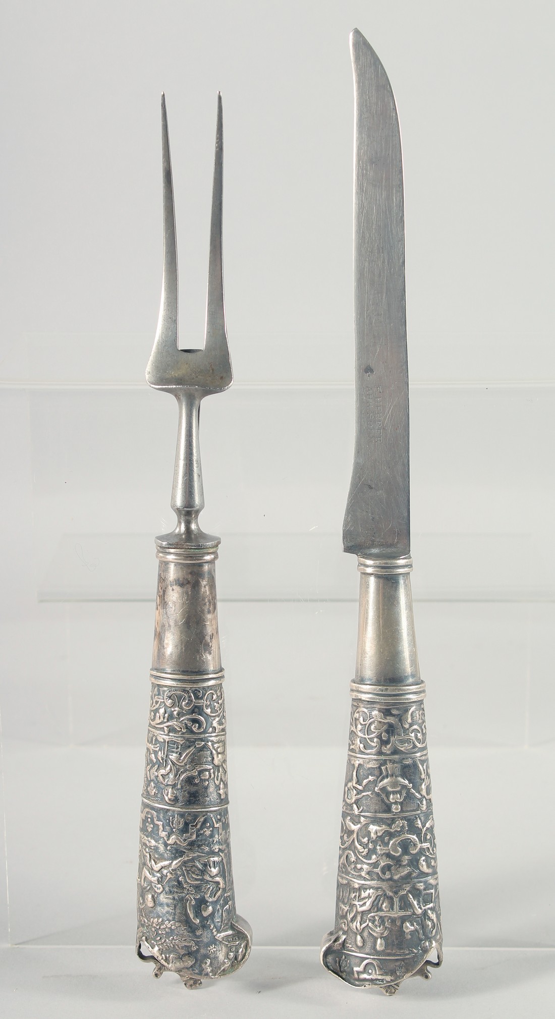 FRIEDRICH HERDER ARR SOHN, a silver handle knife and fork, 12" long.