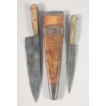 AN EARLY BORDET KNIFE 13" LONG AND A ACIER FONJU KNIFE 11" LONG, both with horn handles, in a