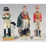 THREE PORCELAIN FIGURES, NAPOLEON, DUKE OF WELLINGTON, OFFICER DES HUSSARDS, 7.5".