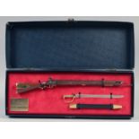 A "SHARP'S" MINIATURE COMMEMORATIVE RIFLE AND SWORD, no. 250 of 2500, 1997, cased.