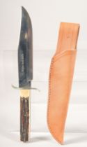 WIDDER SOLINGEN GERMANY ORIGINAL BOWIE KNIFE, with antler handle in a leather sheath, 11" long.