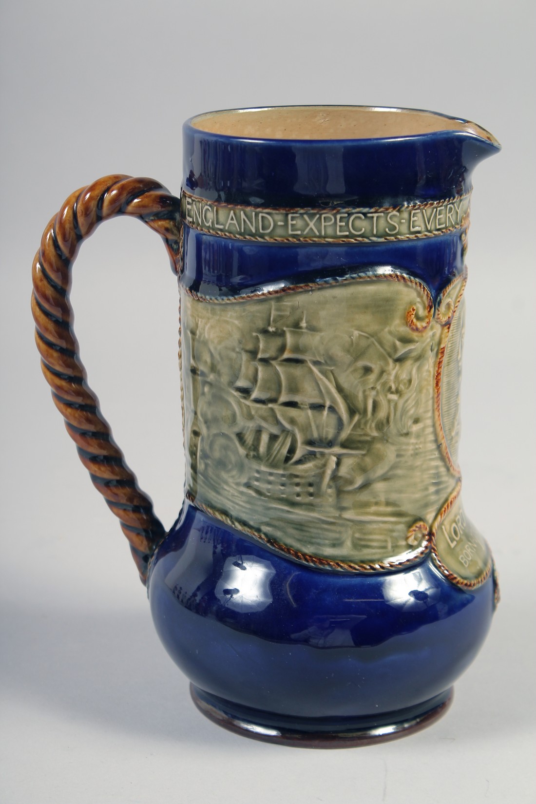 A ROYAL DOULTON STONEWARE JUG, "Lord Nelson born 1758 died 1805", 8". - Image 3 of 7