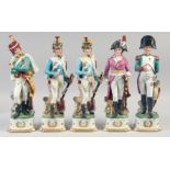 A SET OF FIVE NAPOLEONIC PORCELAIN FIGURES ON BASES.