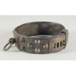 A 17th CENTURY LEATHER STUDDED BRASS DOG COLLAR, with six brass settings, stamped, possibly