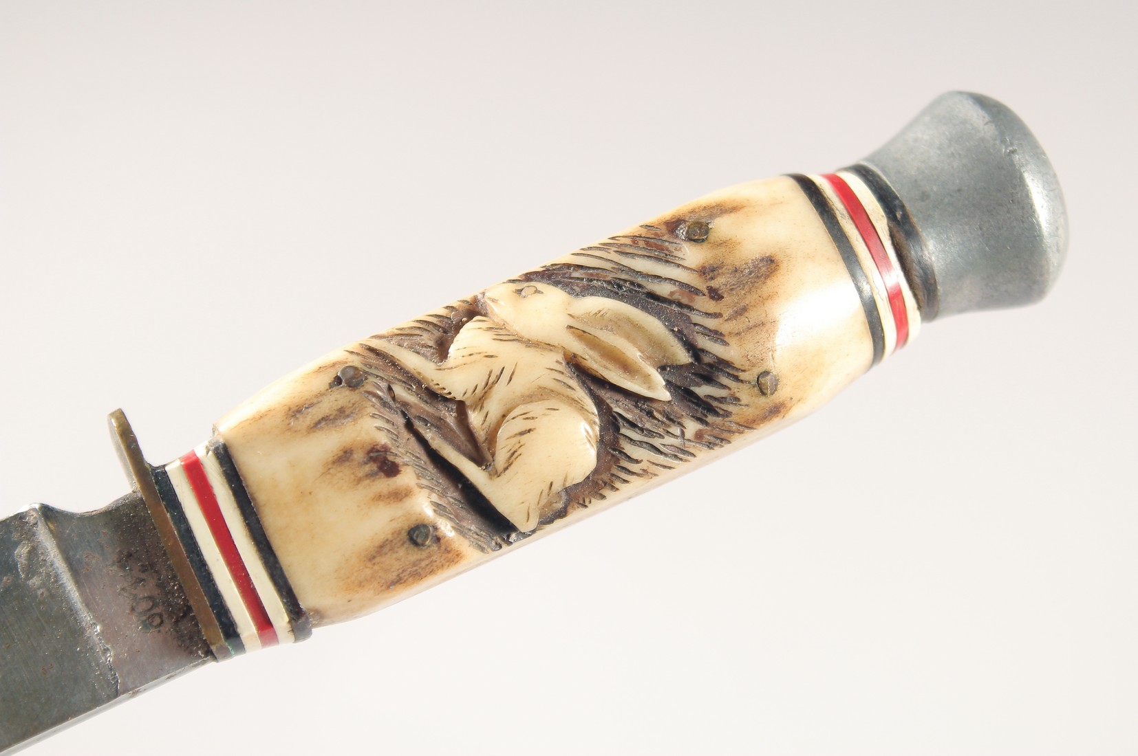 A KINFE, with antler handle carved with a rabbit, REFWAPPEN SOLINGEN, 7.5" long, in a leather - Image 4 of 5