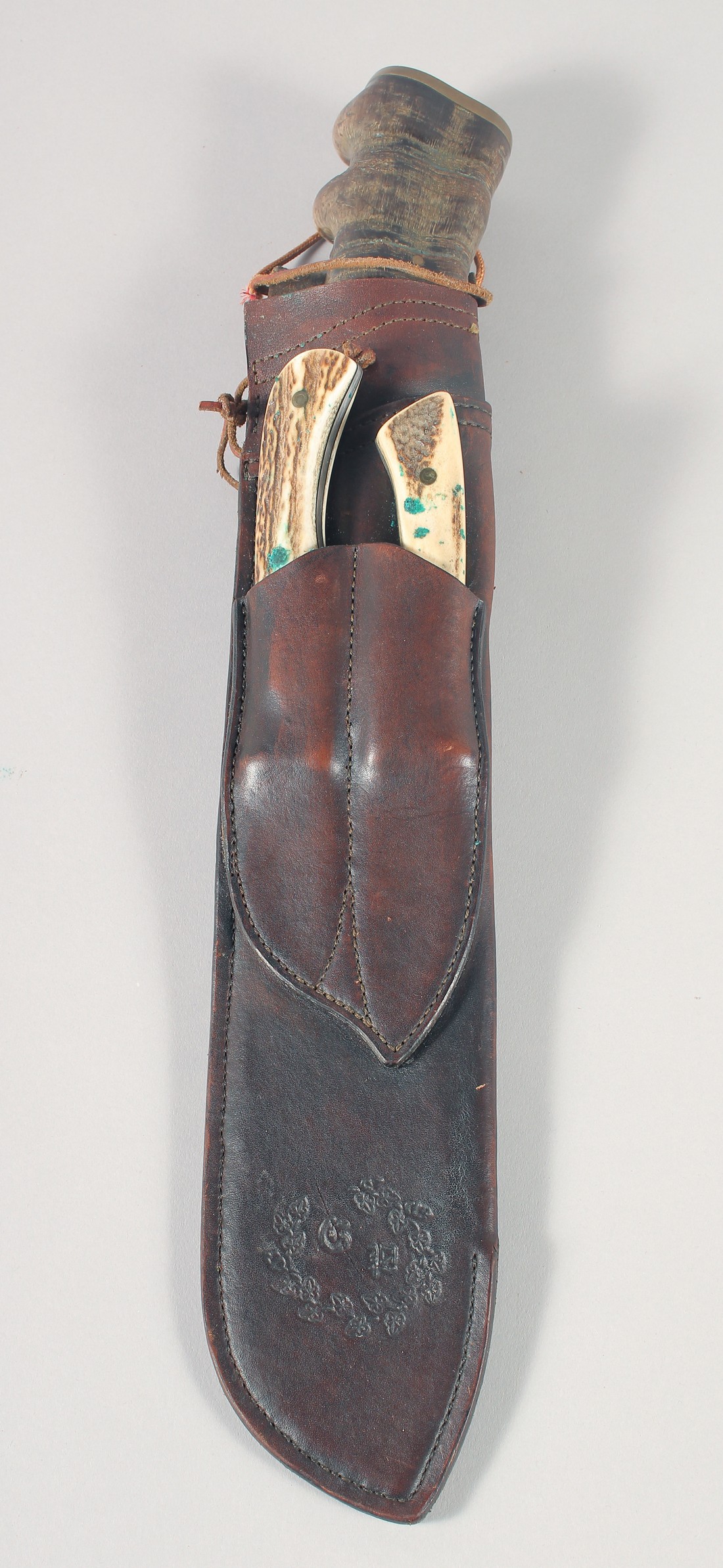 A SUPERB J.J.B. 1943 MACHETE, with fossilized wood handle, 20" long, in a leather scabbard. - Image 6 of 7