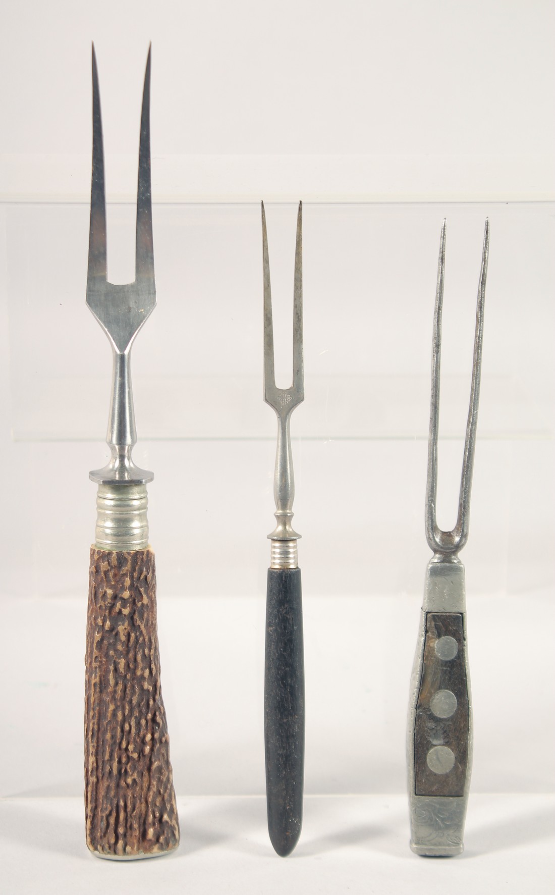 THREE VARIOUS FORKS.