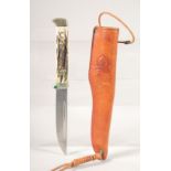THE 6383 PUMA BUDDY KNIFE, with super keen cutting steel, antler handle in a leather sheath.