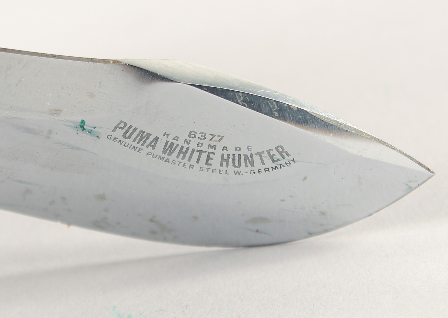 A PUMA WHITE HUNTER 6377 PUMASTER STEEL, with antler handle, 10.5" long, in a leather sheath. - Image 2 of 3