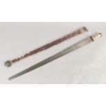 A THEATRICAL REPLICA OF A VIKING BROAD SWORD, early 20th century, wide tapering blunt 37 in blade