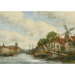 Jan Van Couver (1864-1910) Dutch, A Dutch port scene with moored boats and buildings, watercolour,
