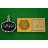 A 1936 Olympic commemorative medallion together with an Olympic miniature perfume flask.