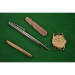 A 9 carat gold propelling pencil, penknife and other items.