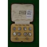 A cased set of cufflinks and dress studs.