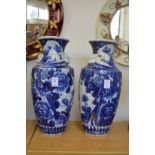 A pair of Oriental blue and white vases.