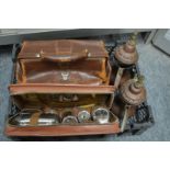Two Eastern copper ewers, a gents travelling vanity case, and a small leather doctor's bag.