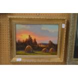 Hayricks at sunset, oil on board.