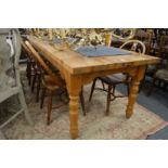 A good large heavy pine kitchen table 9' long x 2' 10" wide.