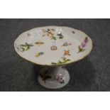 A good Herend porcelain comport decorated with fruit and flowers.