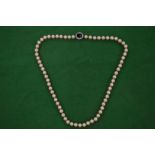 Decorative pearl necklace.