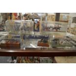 A collection of miniature military figures in five cases.