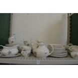 A quantity of Royal Doulton Tumbling Leaves china.