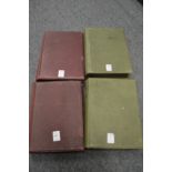 A set of four photograph albums with contents.