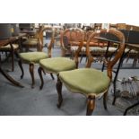 A set of three Victorian walnut dining chairs (faults).