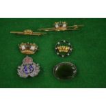Four 14 carat gold and enamel coronet brooches and two other items.