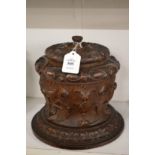 A good carved oak cigar or tobacco jar.