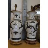 A large pair of Chinese pottery vase lamps (faults).