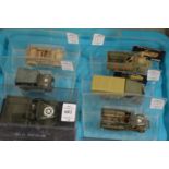 Six various die cast armoured vehicles, in a perspex case.