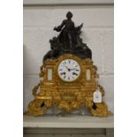 Decorative figural mantel clock.