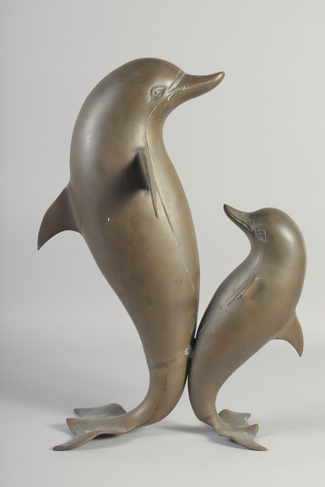 A MODERN ART BRONZE OF TWO DANCING DOLPHINS. 18ins high. - Image 2 of 2