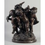 A LARGE AND IMPRESSIVE BRONZE OF CHILDREN PLAYING. 20ins high.