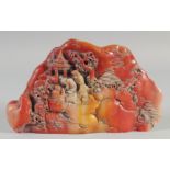 A GOOD CHINESE CARVED HARDSTONE BOULDER. 10ins wide.