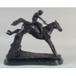 A FINE BRONZE GROUP, HORSE AND JOCKEY OVER THE FENCE, on a marble base. 12ins high.