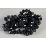 A WHITBY JET GRADUATED BEAD NECKLACE. 32ins long, 69gms.