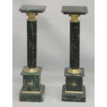 A PAIR OF GREEN MARBLE AND ORMOLU FLUTED MARBLE PEDESTAL COLUMNS. 3ft 4ins x 10ins.