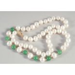 A SMALL 14CT GOLD PEARL AND JADE NECKLACE.