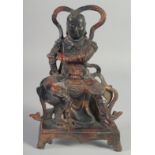 A CHINESE GILT BRONZE GOD FIGURE . 9ins high.