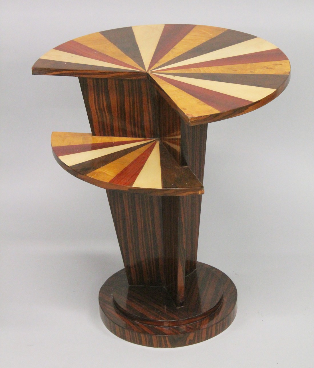 A STYLISH ART DECO STYLE SEGMENTED INLAID TWO TIER TABLE. 1ft 11.5ins x 2ft 2ins high.