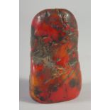 A CHINESE RED SOAP STONE BOULDER SEAL. 3.75ins high.
