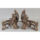 A PAIR OF BRONZE FIGURAL CHENETS. 12ins high.