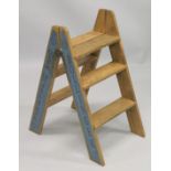 A NOVELTY PINE STEP LADDER. 2ft 8 ins high.